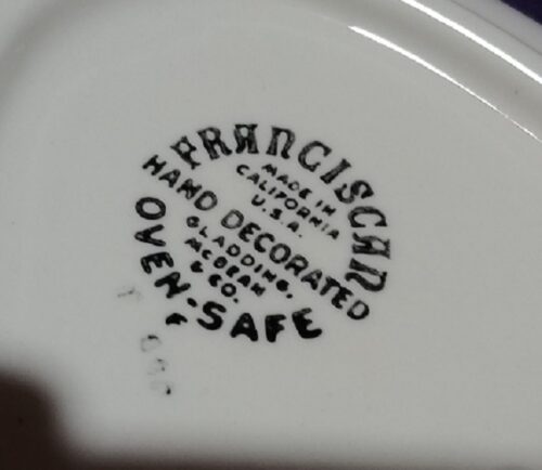 A close up of the word " franciscan " on a plate.