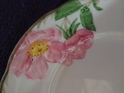 A close up of the flower on a plate