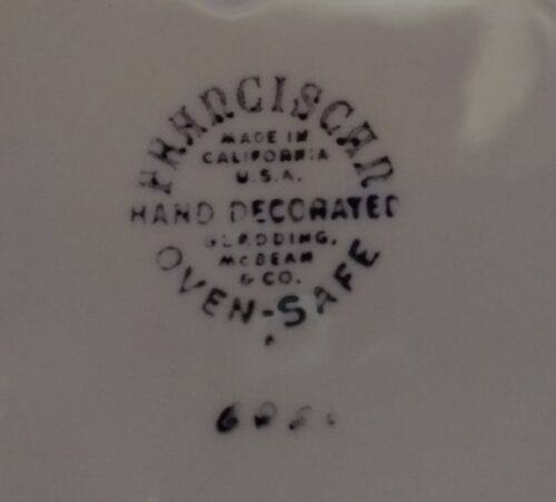 A close up of the plate with the words " francisco " written on it.