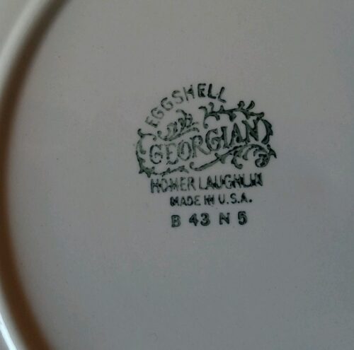 A close up of the stamp on a plate