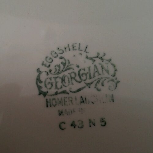 A close up of the stamp on a plate