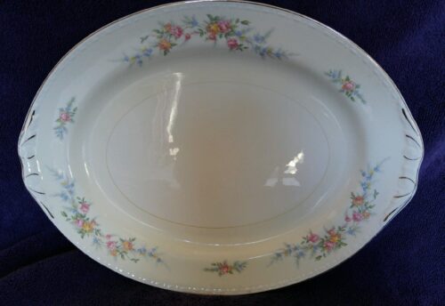 A white plate with flowers on it