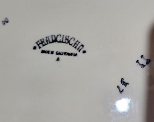 A close up of the lettering on a plate