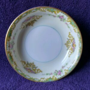 A white plate with some flowers on it