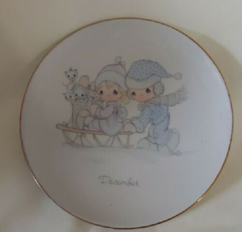 A plate with two little boys on it