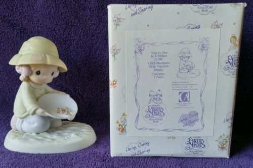 A picture of someone 's autograph book and figurine.