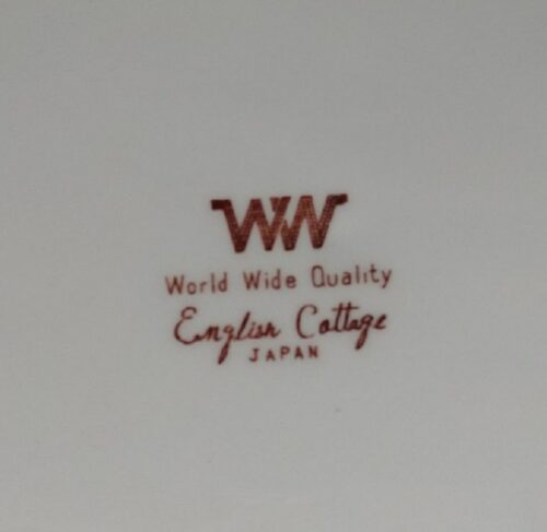 A close up of the world wide quality logo