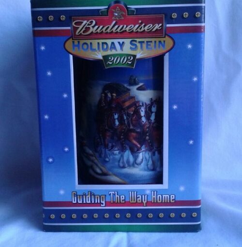 A budweiser holiday stein 2 0 0 2 with a picture of the band.