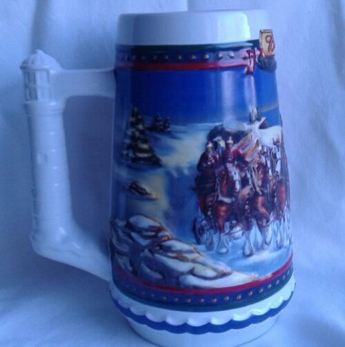 A beer mug with a picture of santa claus on it.