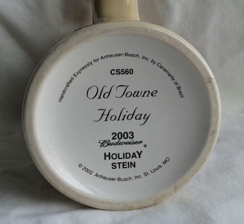 A white bottle with the words " old towne holiday 2 0 0 3 holidaystein ".