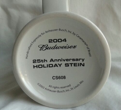 A white plate with the words " 2 5 th anniversary holiday stein ".