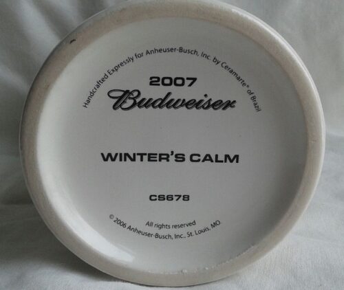 A white plate with the words " winter 's calm " on it.