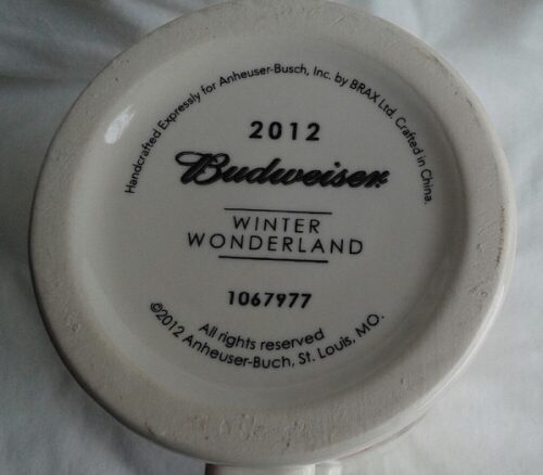 A white plate with the words " budweiser winter wonderland 2 0 1 2 ".