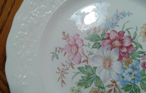 A close up of the flower design on a plate