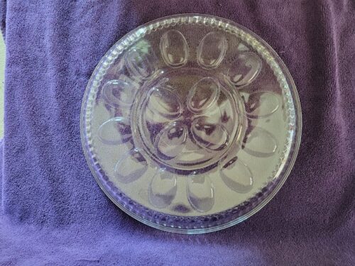 A glass plate with a face on it