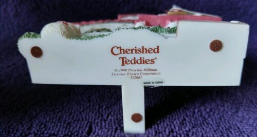 A close up of the label on a teddy bear
