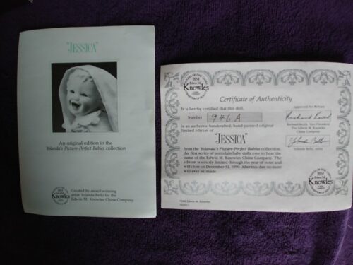 A baby 's birth certificate and photo of the infant.