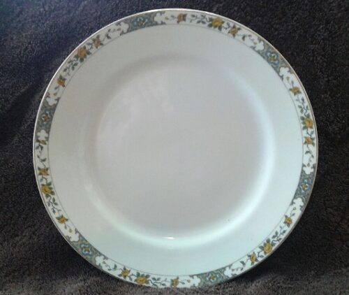 A white plate with flowers on it