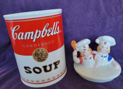 A campbell soup can and salt and pepper shakers.