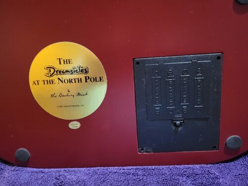 A plaque that says the disney hotel is at the north pole.