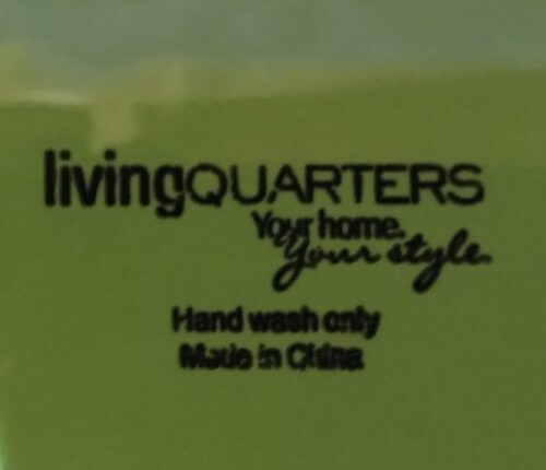 A green background with the words living quarters in black.