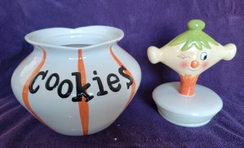 A cookie jar and a tooth brush holder