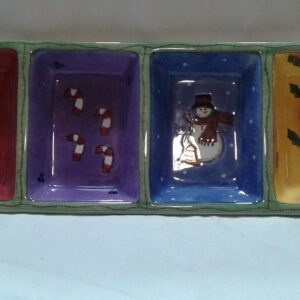 Sango Sweet Shoppe Christmas Relish Tray A colorful tray with four different designs of animals.
