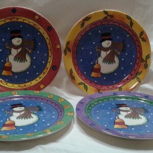 Sango Sweet Shoppe Christmas Salad Plates Four plates with a snowman on them.